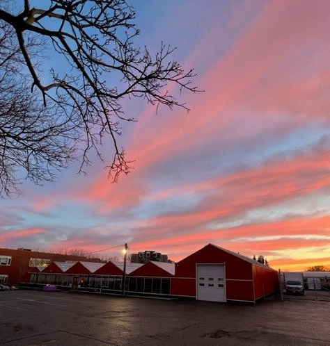 Warren Greenhouses flower greenhouse at sunset.